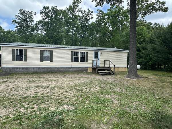 5.44 Acres of Residential Land with Home for Sale in Wellston, Michigan