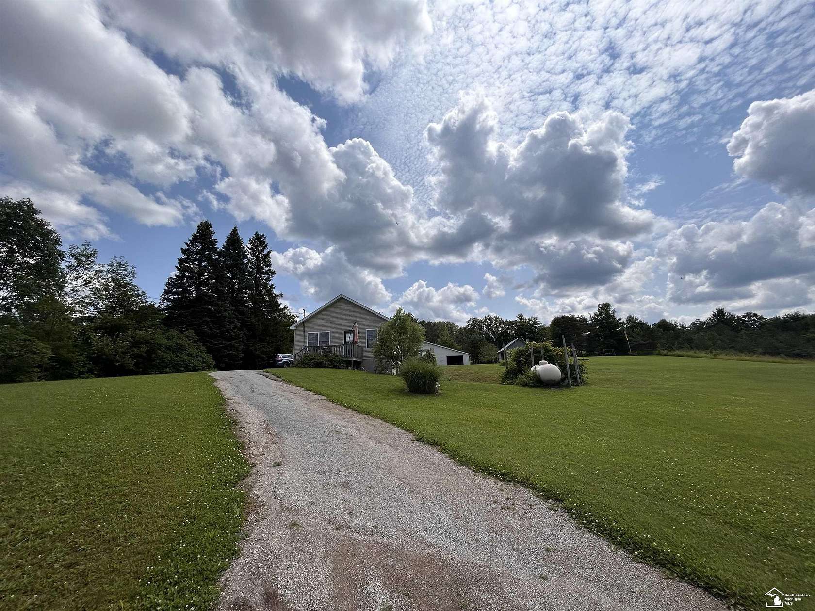 2.5 Acres of Residential Land with Home for Sale in Curran, Michigan