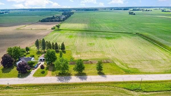 0.99 Acres of Residential Land for Sale in Auburn, Michigan