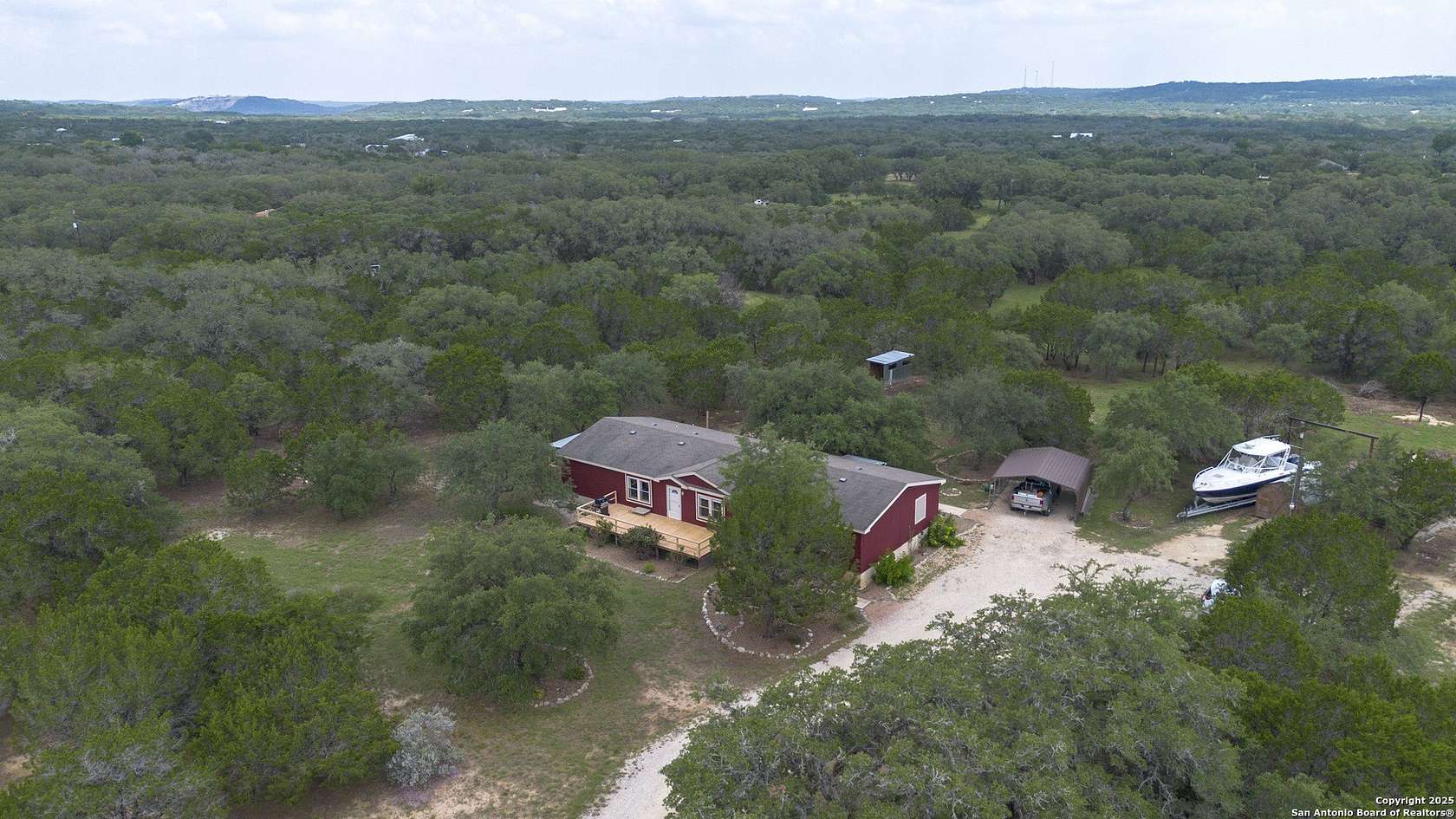 5.14 Acres of Residential Land with Home for Sale in Lakehills, Texas