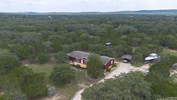 5.14 Acres of Residential Land with Home for Sale in Lakehills, Texas