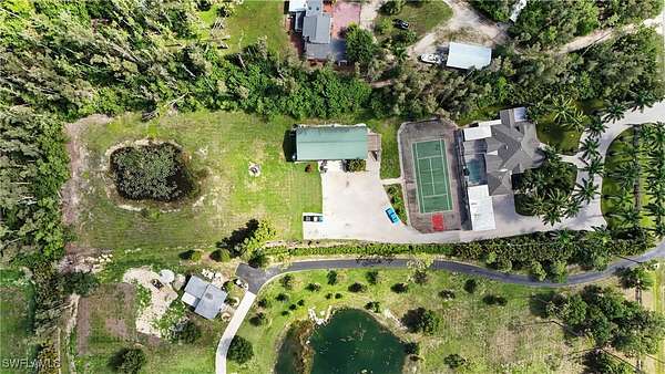 2.39 Acres of Residential Land with Home for Sale in Fort Myers, Florida
