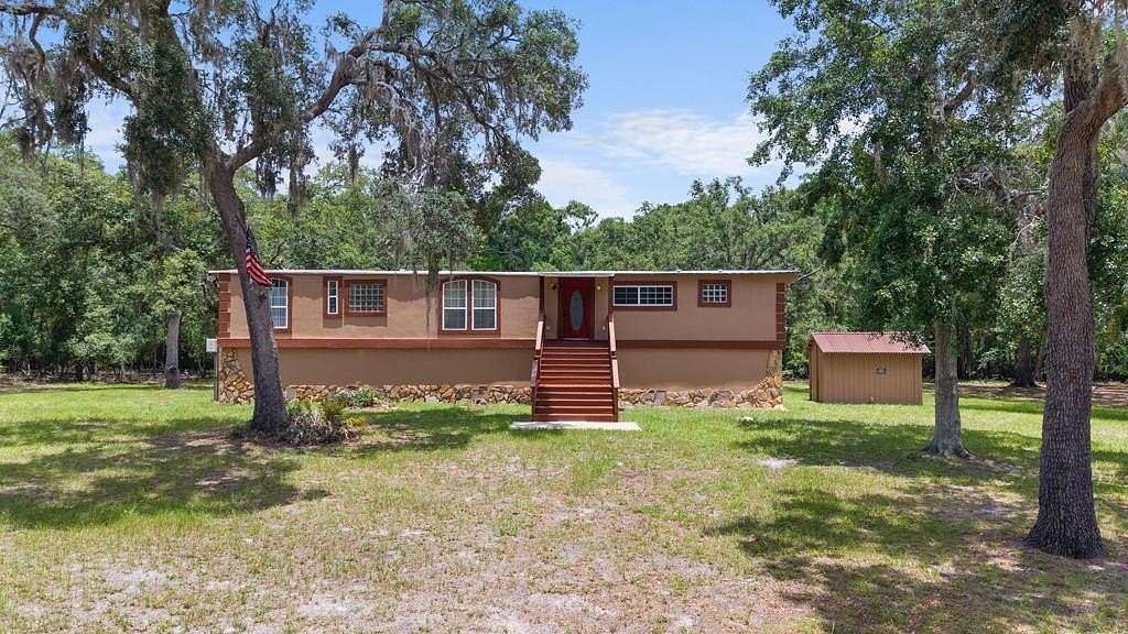 2.4 Acres of Residential Land with Home for Sale in Fanning Springs, Florida