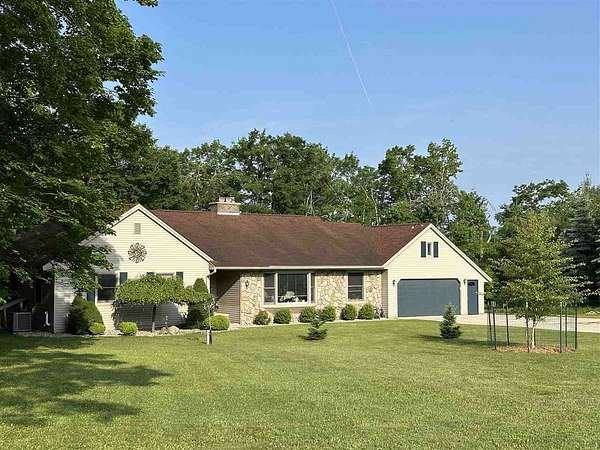 10 Acres of Land with Home for Sale in Charlevoix, Michigan