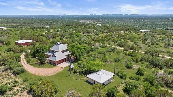10 Acres of Residential Land with Home for Sale in Johnson City, Texas