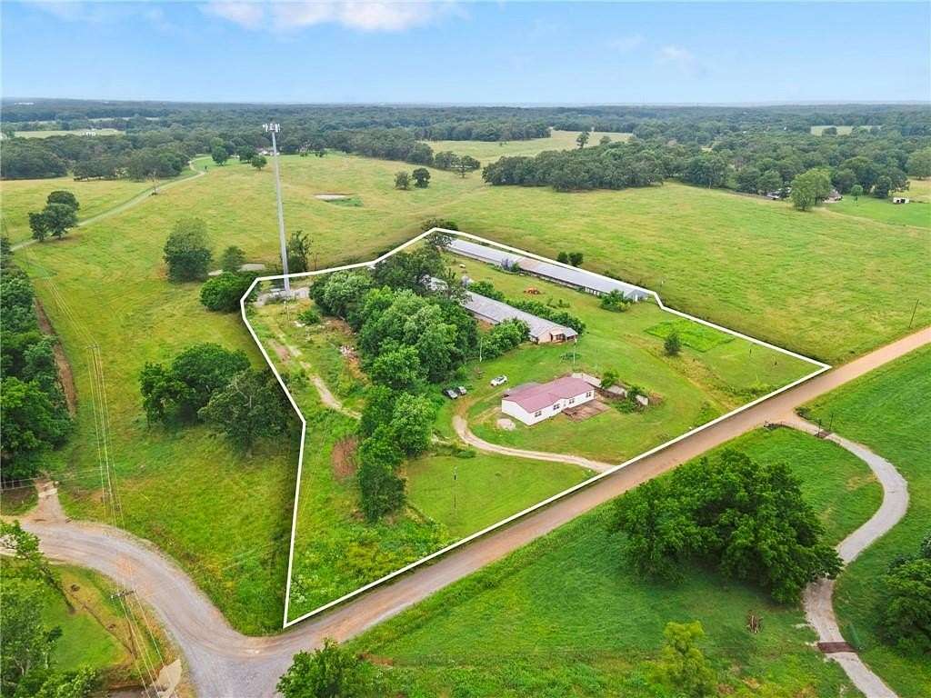 6.45 Acres of Land with Home for Sale in Gentry, Arkansas