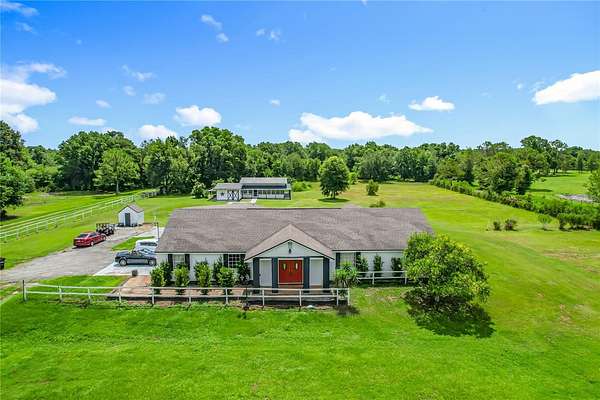 5 Acres of Residential Land with Home for Sale in Polk City, Florida