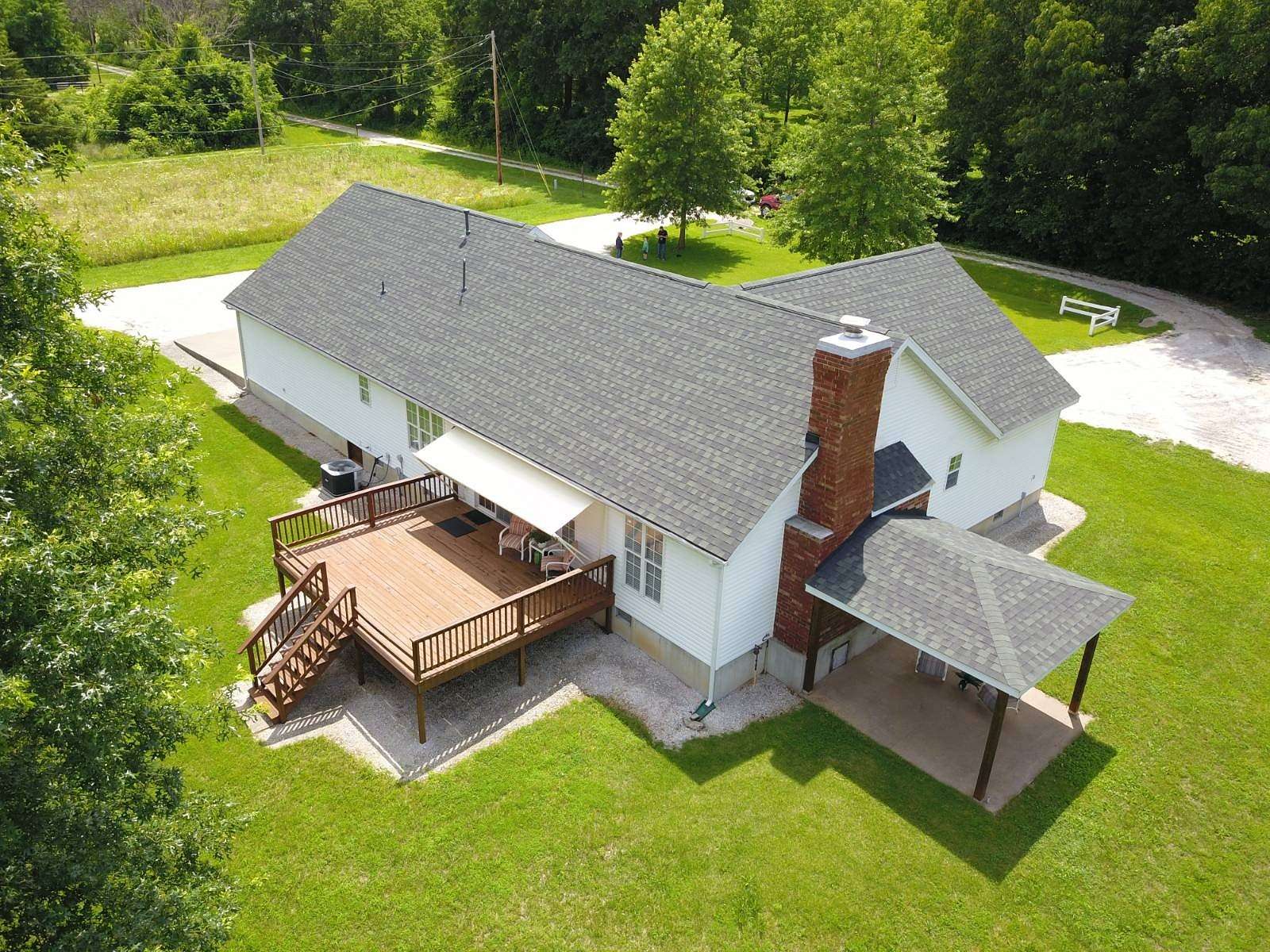 5 Acres of Residential Land with Home for Sale in Stockton, Missouri