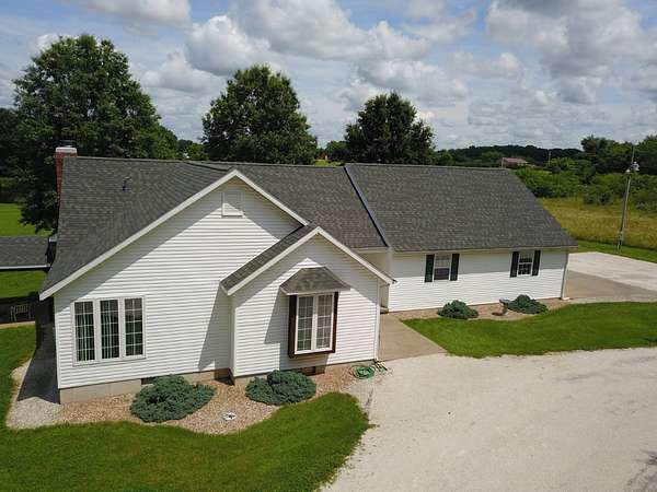 5 Acres of Residential Land with Home for Sale in Stockton, Missouri