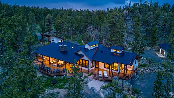 175 Acres of Recreational Land with Home for Sale in Red Feather Lakes, Colorado