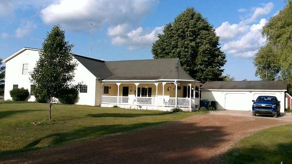 3 Acres of Residential Land with Home for Sale in Beaverton, Michigan