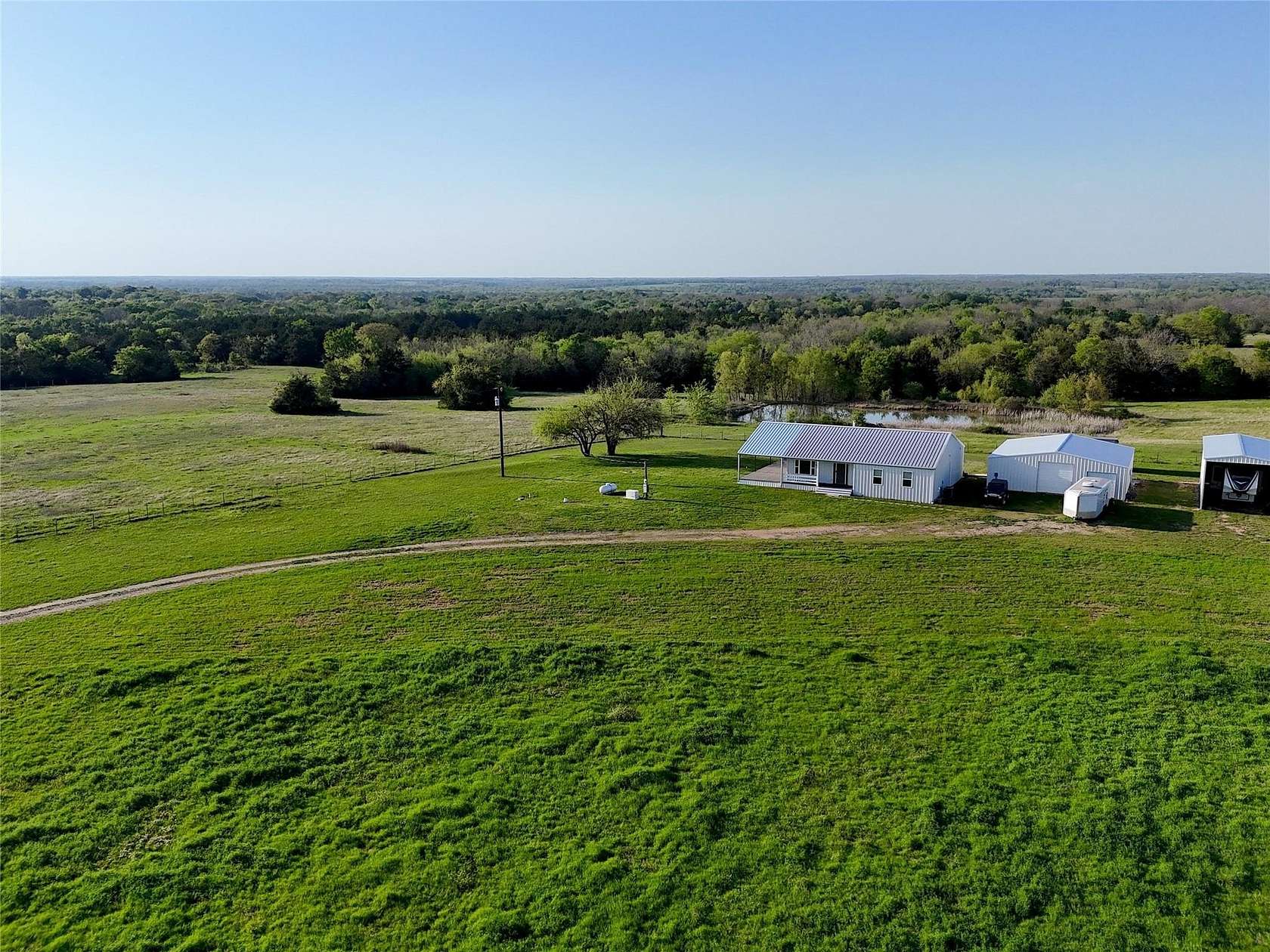 26.1 Acres of Agricultural Land with Home for Sale in Ben Franklin, Texas