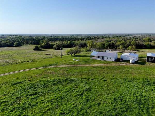 26.1 Acres of Land with Home for Sale in Ben Franklin, Texas