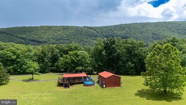 2 Acres of Residential Land with Home for Sale in Great Cacapon, West Virginia