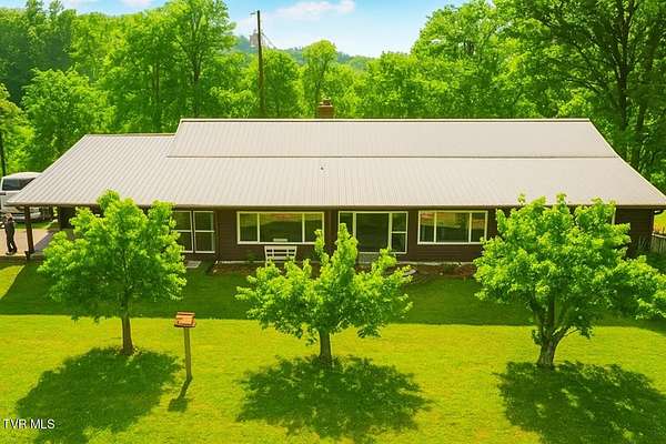 6.67 Acres of Residential Land with Home for Sale in Sevierville, Tennessee