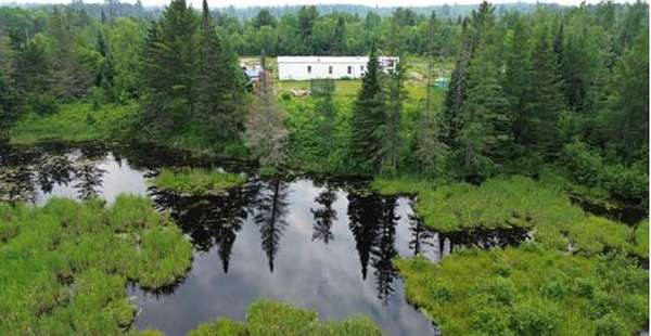 40 Acres of Land with Home for Sale in Republic, Michigan