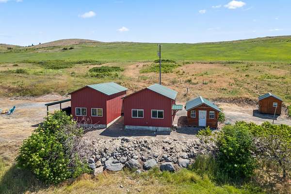 45.3 Acres of Recreational Land with Home for Sale in Hunters, Washington