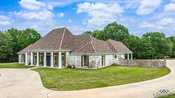 35.7 Acres of Land with Home for Sale in Joaquin, Texas