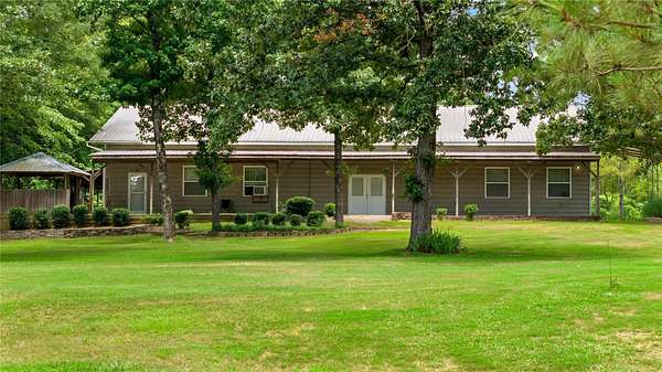 5.74 Acres of Land with Home for Sale in Broken Bow, Oklahoma