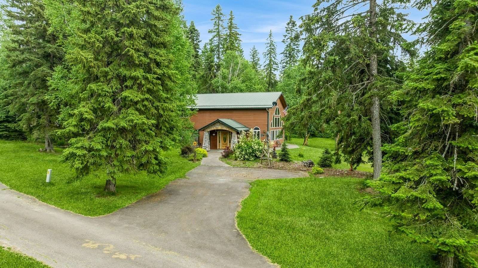 3 Acres of Residential Land with Home for Sale in Columbia Falls, Montana