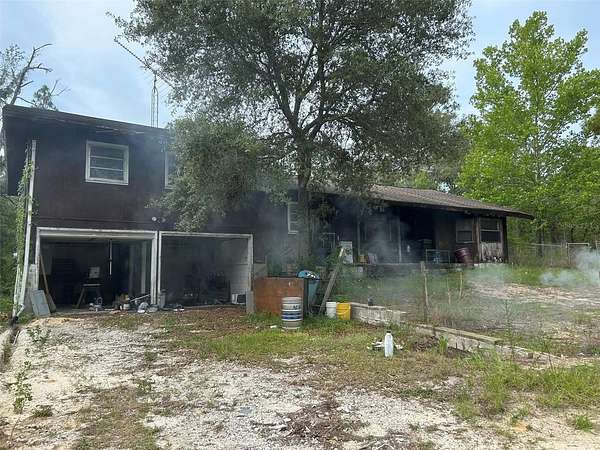 4.8 Acres of Residential Land with Home for Sale in Inverness, Florida