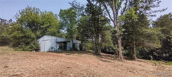 38.6 Acres of Recreational Land with Home for Sale in Cedar Hill, Missouri