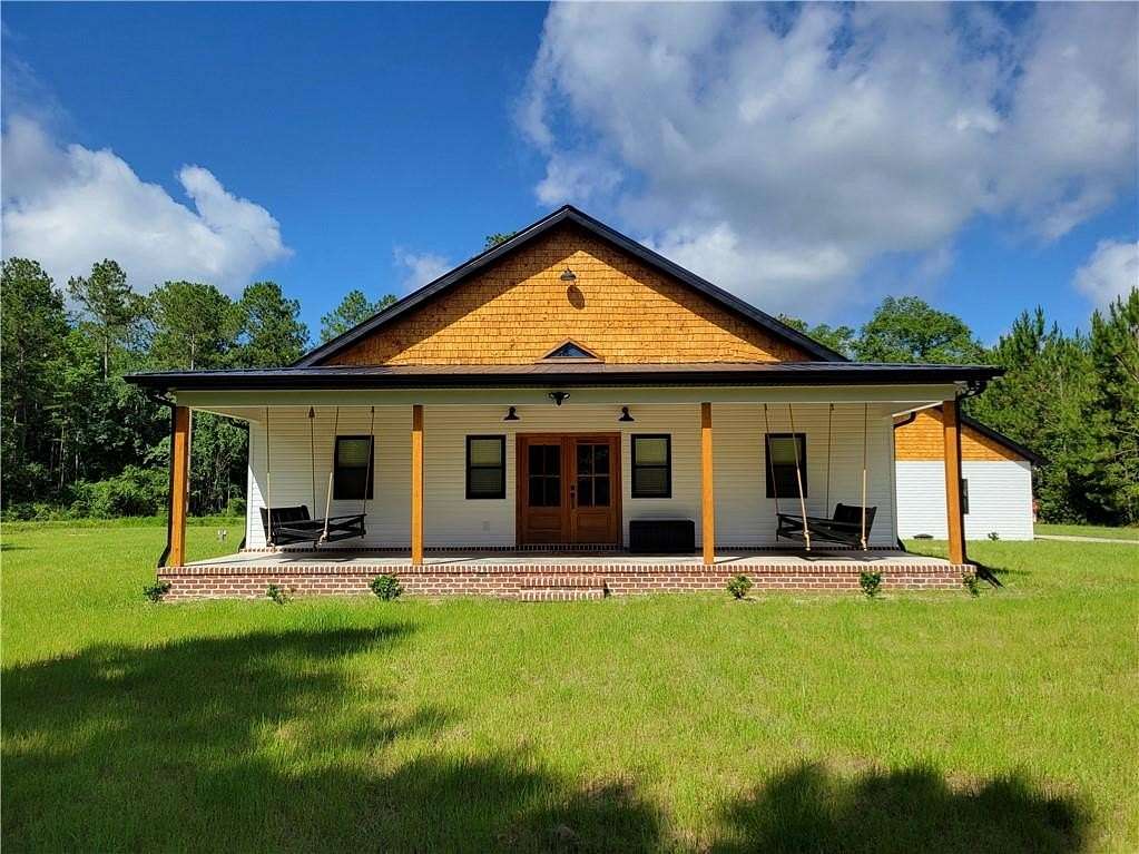 13.7 Acres of Land with Home for Sale in Patterson, Georgia