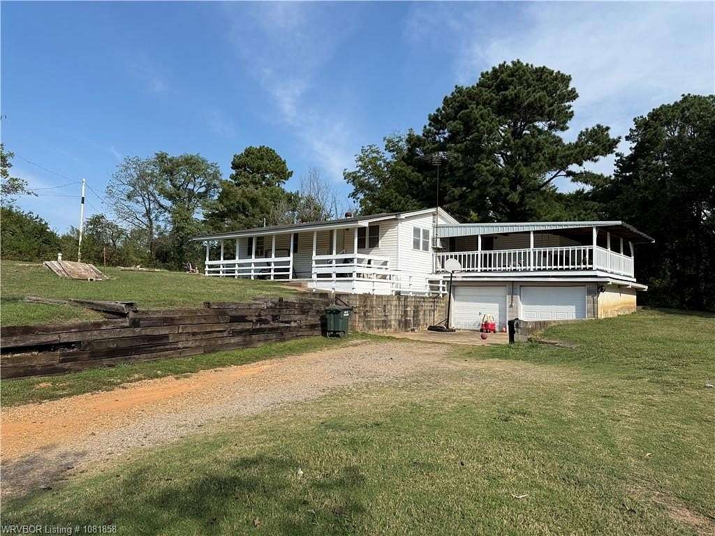 3.2 Acres of Residential Land with Home for Sale in Sallisaw, Oklahoma