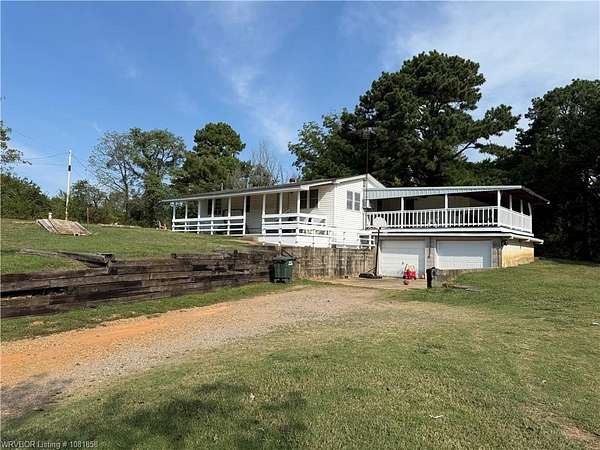 3.2 Acres of Residential Land with Home for Sale in Sallisaw, Oklahoma