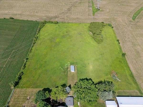 6.4 Acres of Land with Home for Sale in Swisher, Iowa