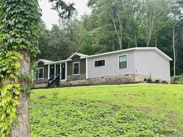 1.55 Acres of Residential Land with Home for Sale in Guntersville, Alabama