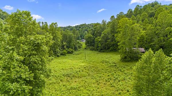 18.5 Acres of Land with Home for Sale in Campton, Kentucky