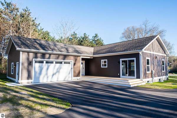 1.5 Acres of Residential Land with Home for Sale in Traverse City, Michigan