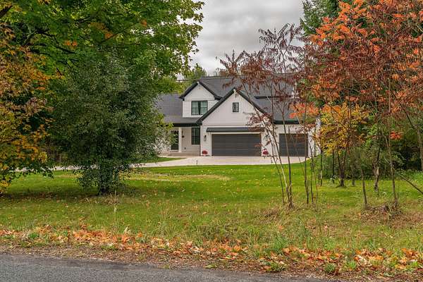 1.79 Acres of Residential Land with Home for Sale in Richland, Michigan