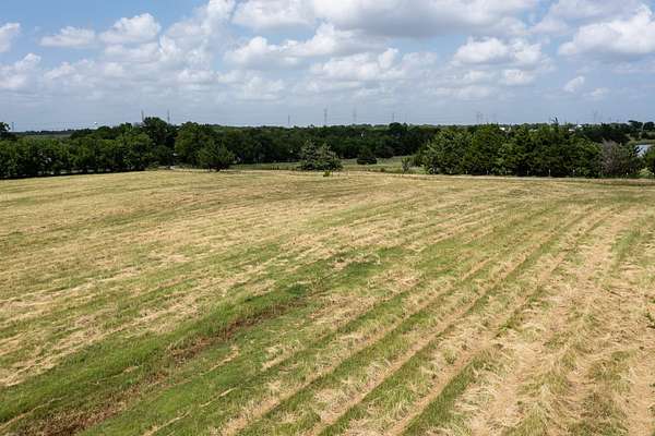 9.15 Acres of Land with Home for Sale in Fate, Texas