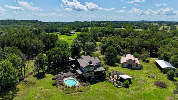 39.2 Acres of Land with Home for Sale in Rudy, Arkansas