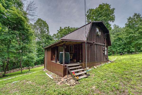 10 Acres of Residential Land with Home for Sale in Witts Springs, Arkansas