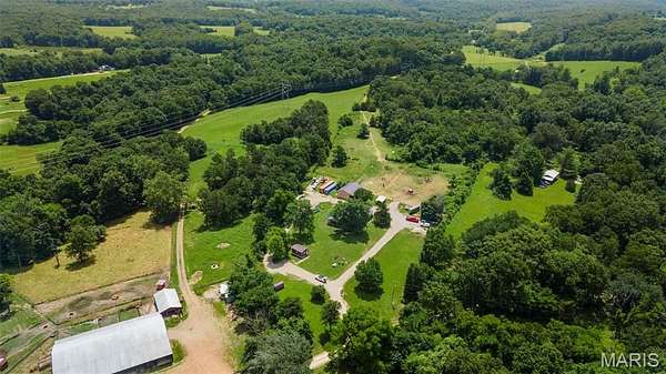 14.3 Acres of Land with Home for Sale in Marble Hill, Missouri