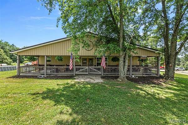 14.3 Acres of Land with Home for Sale in Marble Hill, Missouri