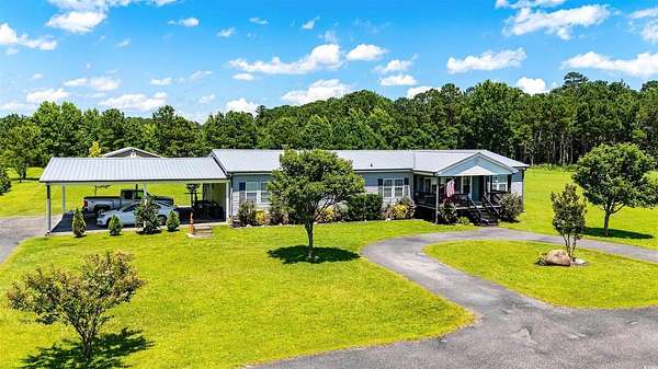 11.4 Acres of Land with Home for Sale in Loris, South Carolina