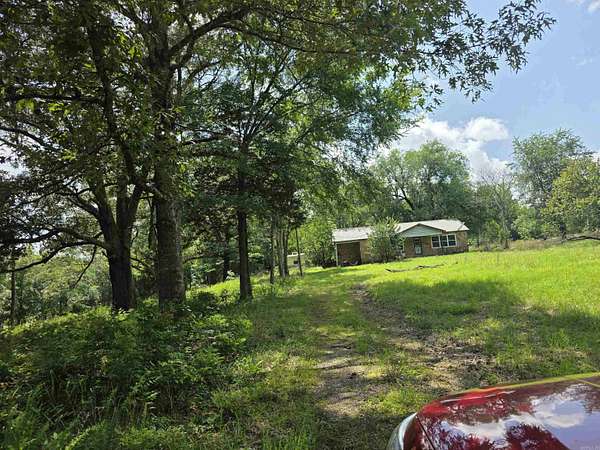 4.1 Acres of Residential Land with Home for Sale in Mena, Arkansas