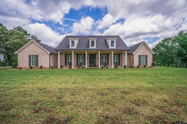 5 Acres of Land with Home for Sale in Jacksonville, Texas