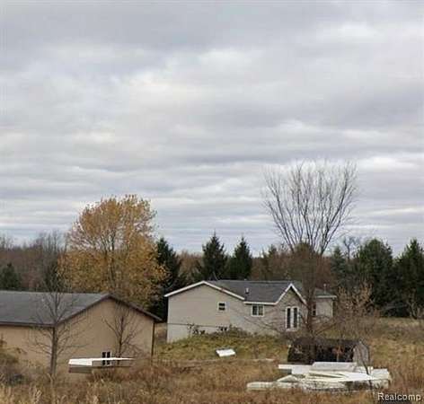 4.82 Acres of Residential Land with Home for Sale in Webberville, Michigan