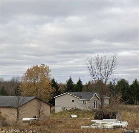 4.82 Acres of Residential Land with Home for Sale in Webberville, Michigan