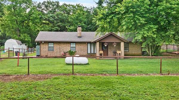 15.3 Acres of Land with Home for Sale in Watts, Oklahoma