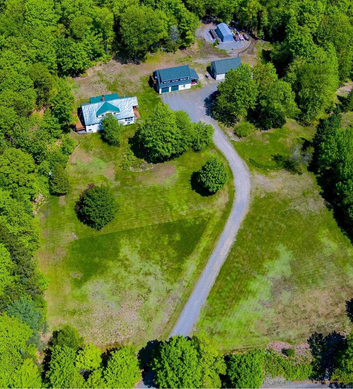 26.8 Acres of Recreational Land with Home for Sale in Sangerville, Maine