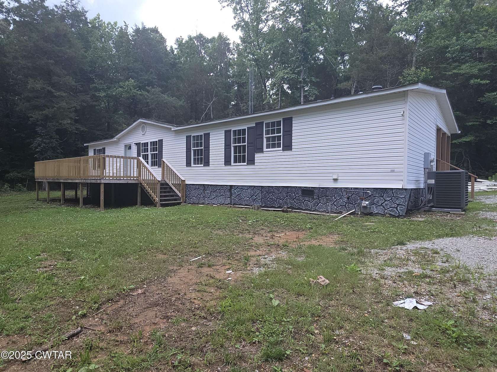 9.5 Acres of Residential Land with Home for Sale in Beech Bluff, Tennessee