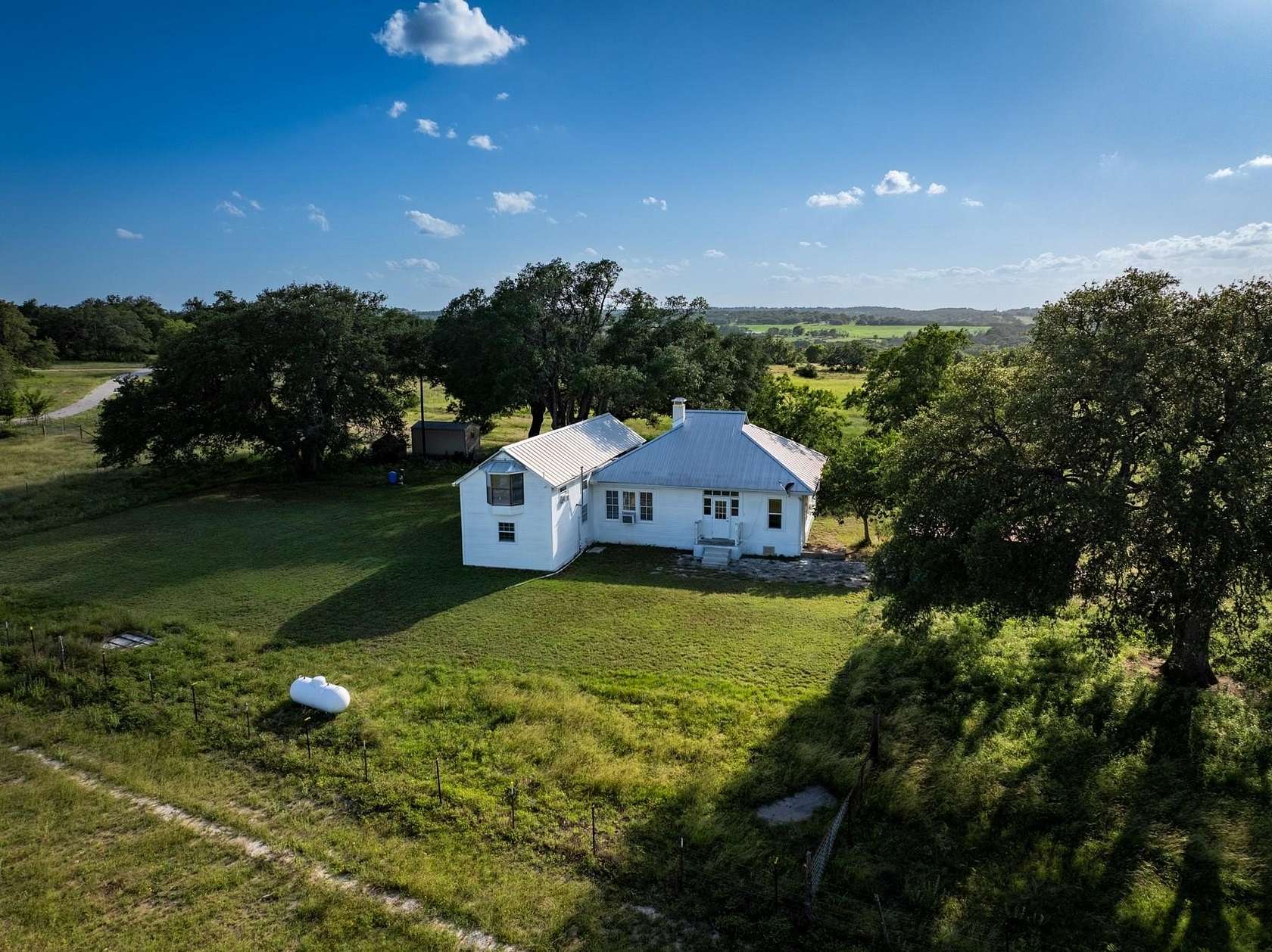 10.4 Acres of Land with Home for Sale in Stonewall, Texas