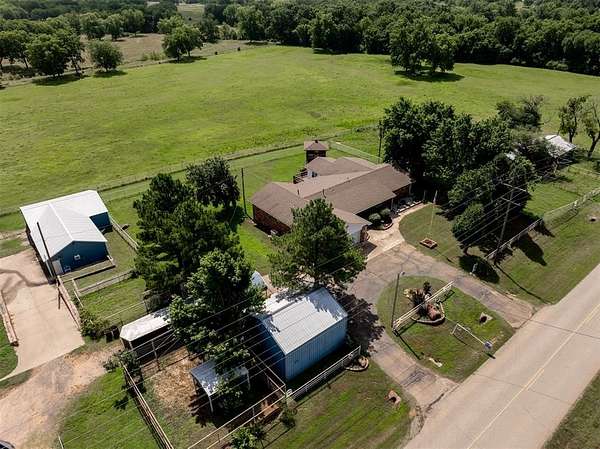 215 Acres of Agricultural Land with Home for Sale in Paden, Oklahoma