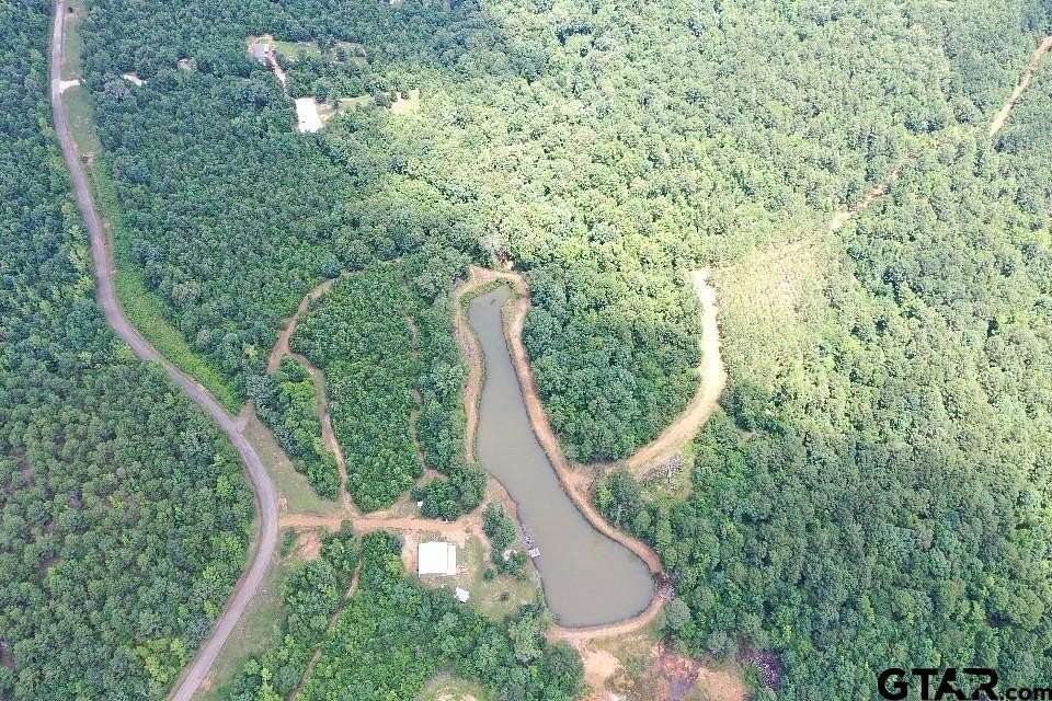 147 Acres of Land with Home for Sale in Lone Star, Texas